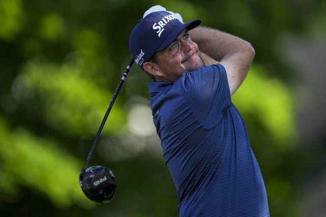 Jun 28, 2025; Detroit, Michigan, USA; Keegan Bradley plays his shot from the 12th tee during the third round of the Rocket Mortgage Classic golf tournament. Mandatory Credit: Aaron Doster-Imagn Images/File Photo