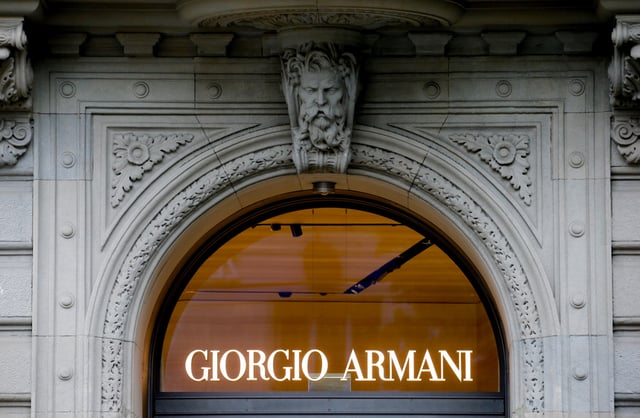 The logo of Italian fashion company Giorgio Armani is seen at a shop in Zurich, Switzerland July 8, 2021.  REUTERS/Arnd Wiegmann/File Photo