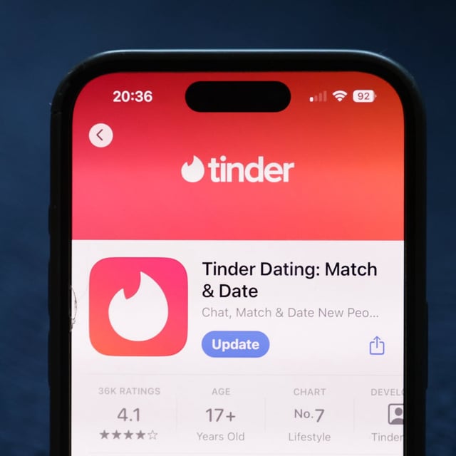 Tinder on App Store displayed on a phone screen