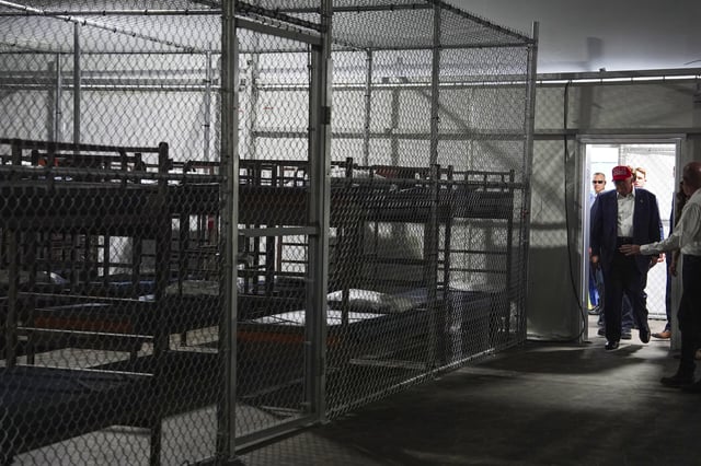 President Trump at a new immigration detention facility in Florida. (AP Photo/Evan Vucci)