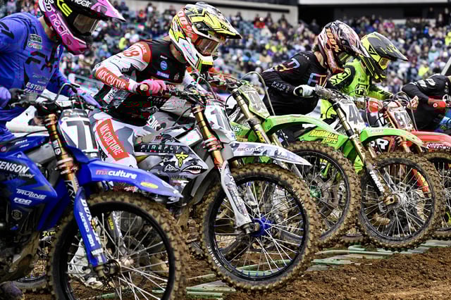 FILE: Riders are shown at the starting gate during the Monster Energy AMA Supercross Championship on April 12, 2025, at Lincoln Financial Field in Philadelphia, Penn.