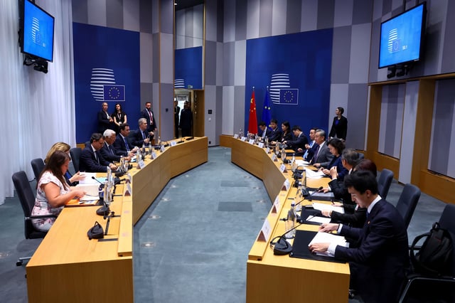 Chinese Foreign Minister Wang Yi meets with European Council President Antonio Costa in Brussels, Belgium July 2, 2025. REUTERS/Yves Herman