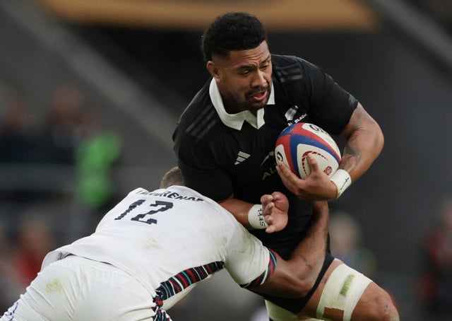 Rugby Union - Autumn International - England v New Zealand - Allianz Stadium Twickenham, London, Britain - November 2, 2024 New Zealand's Ardie Savea in action with England's Ollie Lawrence Action Images via Reuters/Paul Childs/File Photo