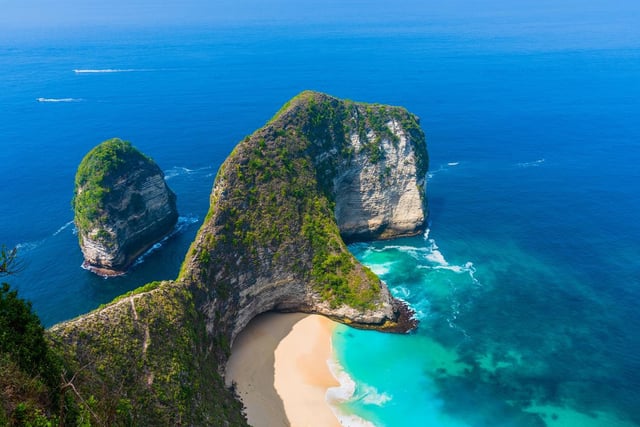 Two people are believed to be dead and dozens more are still missing after a ferry sank off the coast of Bali.