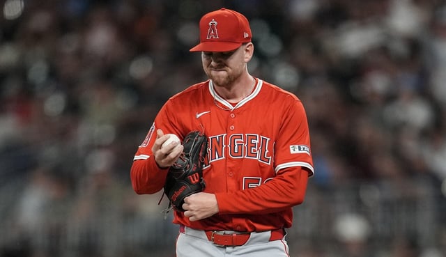 Angels relief pitcher Ryan Zeferjahn tries to collect himself on the mound during the sixth inning of their game against the Atlanta Braves on Wednesday night in Atlanta. Zeferjahn gave up a go-ahead three-run homer and a grand slam in a 16-pitch disaster of an outing as the Angels lost, 8-3. (AP Photo/Mike Stewart)