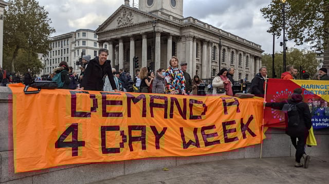 Protestors call for a four-day working week to tackle climate change outside Glasgow's COP26 climate conference in 2021. Image: 4 Day Week Campaign