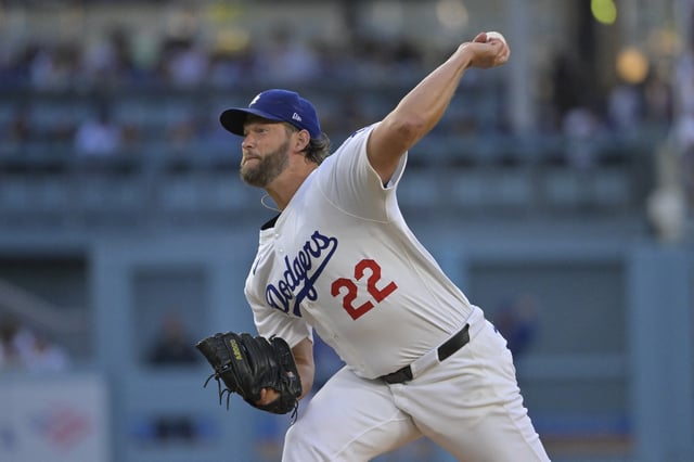 Jul 2, 2025; Los Angeles, California, USA;  Los Angeles Dodgers pitcher Clayton Kershaw (22) pitches during the first inning against the Chicago White Sox at Dodger Stadium. Mandatory Credit: Jayne Kamin-Oncea-Imagn Images