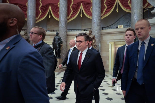 Speaker of the House Mike Johnson (R-LA) is surrounded by security and staff as he heads to the House Chamber for a procedural vote on the One Big Beautiful Bill Act in the U.S. Capitol on July 02, 2025 in Washington, DC.