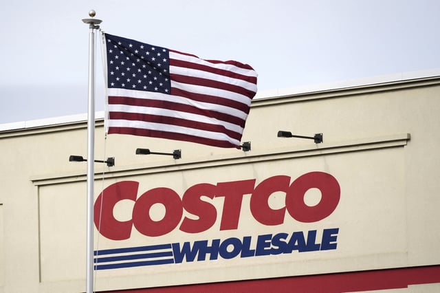 A file photo displays an American flag flying outside of a Costco Warehouse in Cranberry, Pennsylvania, on March 7, 2025.