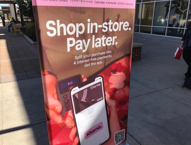 A sign advertising buy now, pay later firm Klarna.