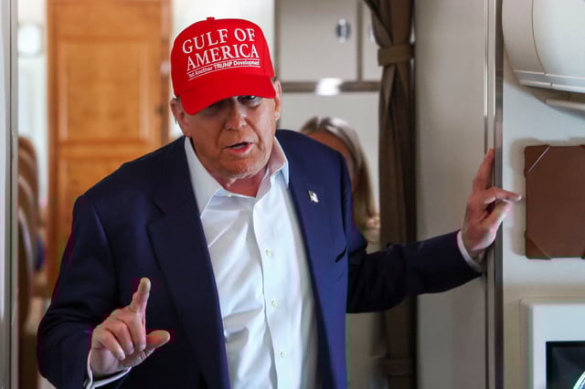U.S. President Donald Trump speaks to reporters aboard Air Force One en route to Joint Base Andrews, Maryland, after touring a temporary migrant detention center informally known as "Alligator Alcatraz" in Ochopee, Florida, U.S., July 1, 2025. REUTERS/Evelyn Hockstein/File Photo