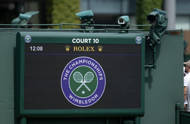 Hawk-Eye cameras survey the courts at Wimbledon.
