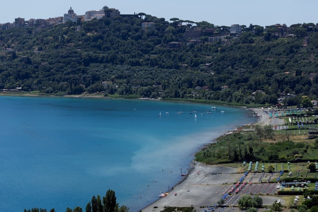 A general view of the town of Castel Gandolfo overlooking Lake Albano, near Rome, where Pope Leo will spend two weeks of vacation in July, Italy, July 1, 2025. REUTERS/Remo Casilli