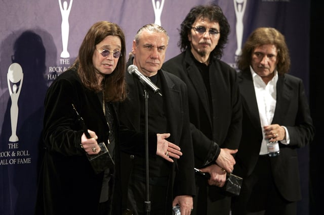 Members of Black Sabbath band Ozzy Osbourne, Bill Ward, Tony Iommi and Geezer Butler (L-R) pose backstage at the Rock and Roll Hall of Fame induction ceremony at the Waldorf Astoria Hotel in New York March 13, 2006.