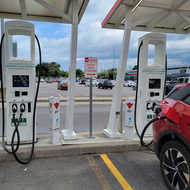 A 2022 Volkswagen ID.4 EV is shown at a charging station at a Scarborough, Ontario on Wednesday June 14, 2023. THE CANADIAN PRESS/Doug Ives