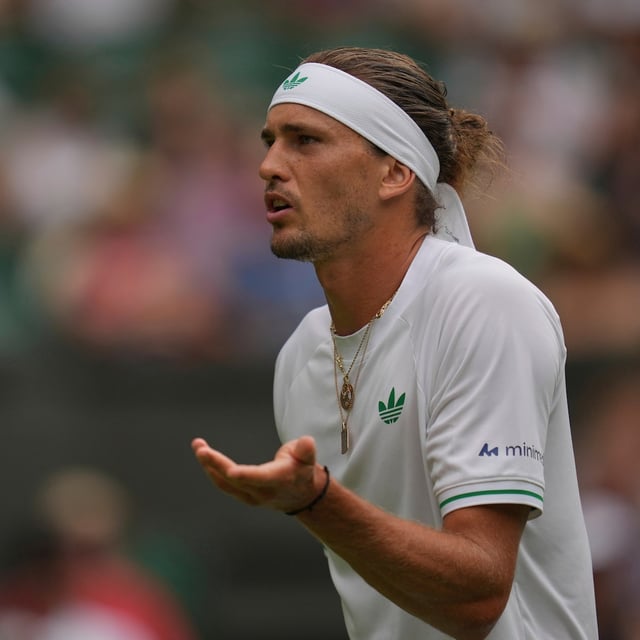 Alexander Zverev of Germany reacts as he plays Arthur Rinderknech of France during their first round men's singles match at the Wimbledon Tennis Championships in London, Tuesday, July 1, 2025. (AP Photo/Kin Cheung)