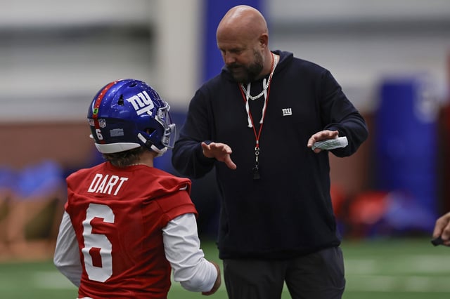 New York Giants head coach Brian Daboll talks to quarterback Jaxson Dart (6) during rookie minicamp at NY Giants Quest Diagnostics Training Center on May 09, 2025 in East Rutherford, New Jersey