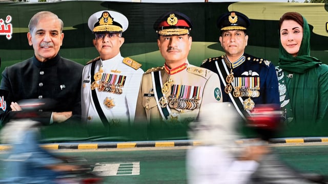 Portraits of Shehbaz Sharif, Navy Chief Admiral Naveed Ashraf (3L), Chief of Army Staff General Syed Asim Munir (C), Air Chief Marshal Zaheer Ahmad Baber (3R) and Chief Minister of the country's Punjab province Maryam Nawaz Sharif in Lahore