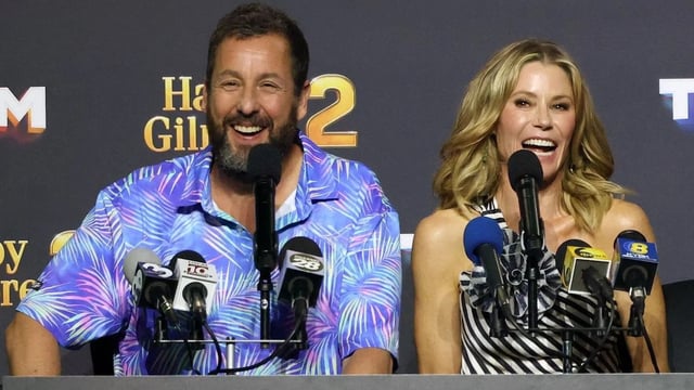 Adam Sandler and Julie Bowen at Netflix's Tudum 2025 (Photo by Kevin Mazur/Getty Images for Netflix)