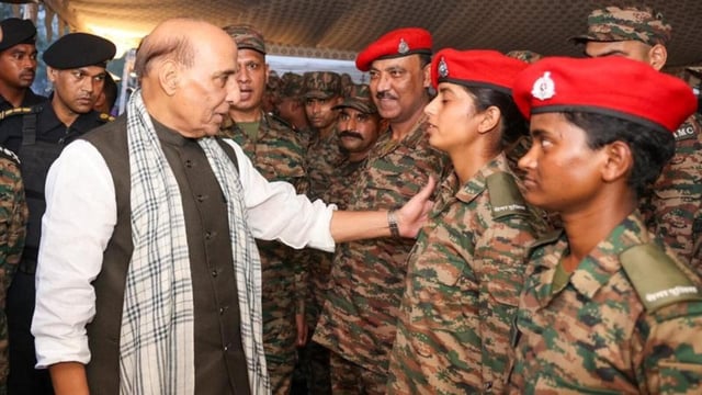 Defence minister Rajnath Singh with women defence personnel at the Northern Command HQ in Udhampur. (Photo from X)