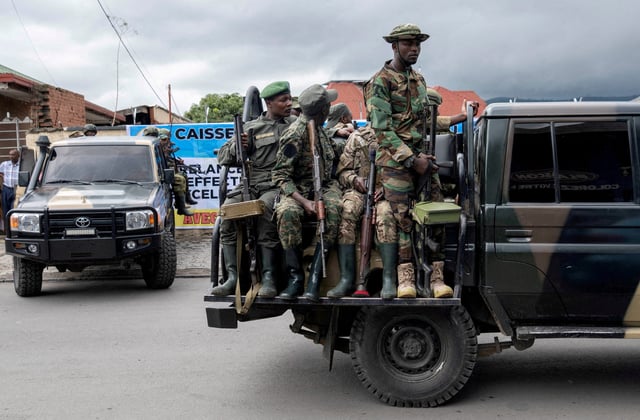 Members of the M23 rebel group ride on their vehicles after the opening ceremony of Caisse Generale d'epargne du Congo in Goma, North Kivu province in the East of the Democratic Republic of Congo, April 7, 2025. REUTERS/Arlette Bashizi/File Photo