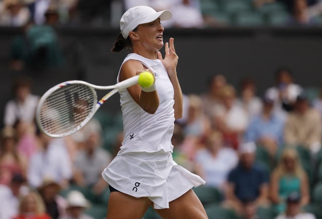 Tennis - Wimbledon - All England Lawn Tennis and Croquet Club, London, Britain - July 3, 2025 Poland's Iga Swiatek in action during her second round match against Caty McNally of the U.S. REUTERS/Andrew Couldridge