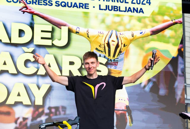 Tour de France champion Tadej Pogacar stands on stage during welcome ceremony in Ljubljana, Slovenia, July 24, 2024. REUTERS/Antonio Bronic/File Photo