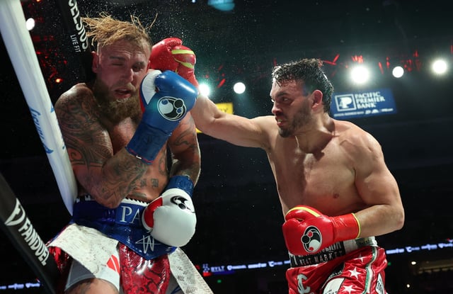 USA’s Jake Paul (L) and Mexico’s Julio Cesar Chavez Jr. fight during their cruiserweight boxing bout at the Honda Center in Anaheim, California, on June 28, 2025. (Photo by Patrick T. Fallon / AFP) (Photo by PATRICK T. FALLON/AFP via Getty Images)
