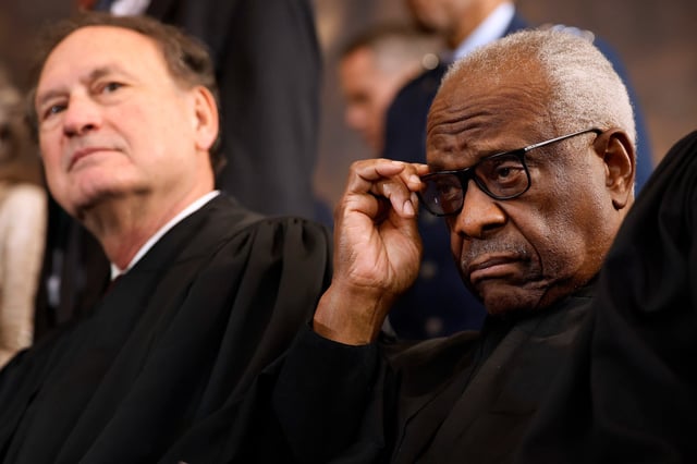 Supreme Court Associate Justices Samuel Alito and Clarence Thomas.