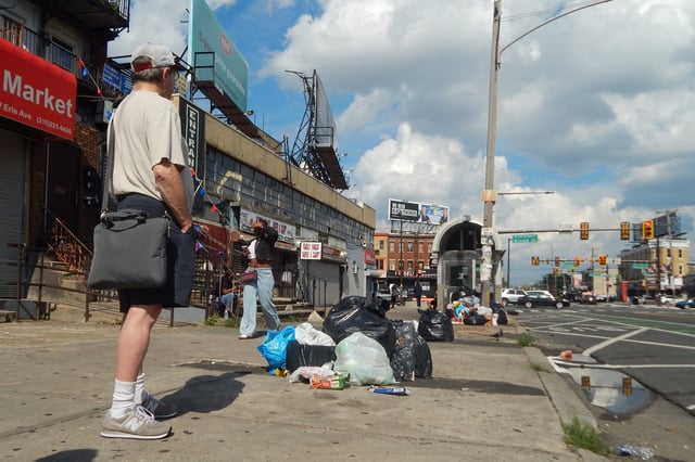 Trash piles along the curb at Erie Avenue and North Broad Street as city workers strike for fair wages in Philadelphia on July 2, 2025.
