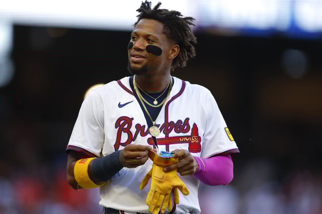 ATLANTA, GEORGIA - JULY 2: Ronald Acuña Jr. #13 of the Atlanta Braves reacts during the first inning against the Los Angeles Angels at Truist Park on July 2, 2025 in Atlanta, Georgia.