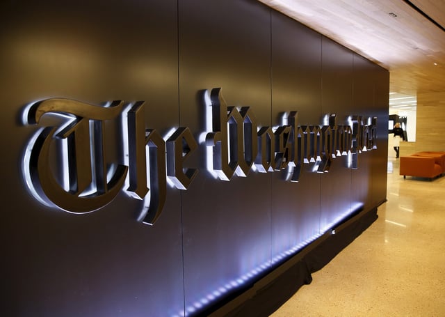 The newspaper's banner logo is seen during the grand opening of the Washington Post newsroom in Washington January 28, 2016.  REUTERS/Gary Cameron/File Photo