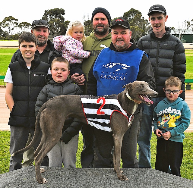 The Bouchier family and trainer David Peckham with Dimora Bluey after his first up win at Tara Raceway. (Submitted)
