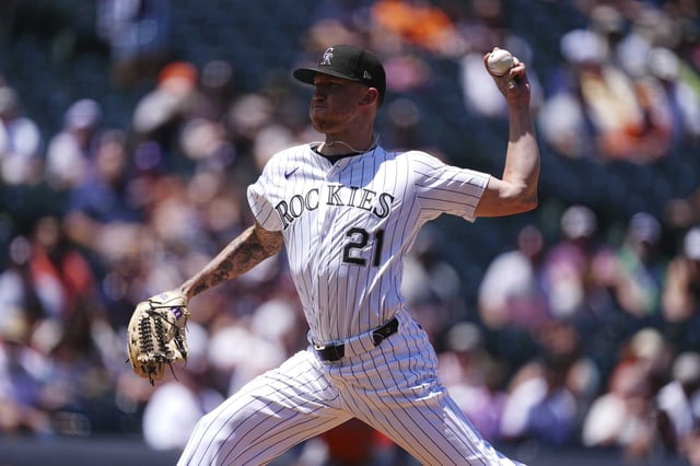 Colorado Rockies starting pitcher Kyle Freeland works against the Houston Astros in the first inning of a baseball game Thursday, July 3, 2025, in Denver. (AP Photo/David Zalubowski)