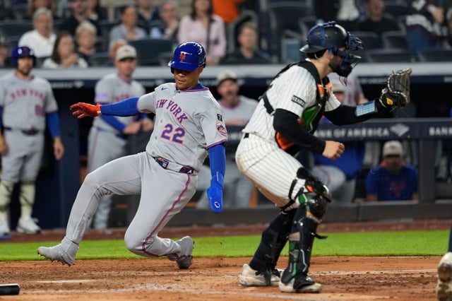New York Mets&#39; Juan Soto, left, scores behind New York Yankees catcher Austin Wells on single hit by Brandon Nimmo during the fourth inning of a baseball game Friday, May 16, 2025, in New York. (AP Photo/Seth Wenig)