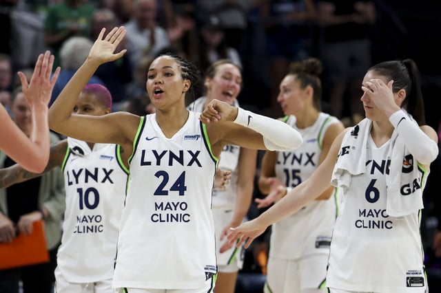 Napheesa Collier #24 of the Minnesota Lynx celebrates with her team after winning a game against the Connecticut Sun at Target Center on June 29, 2025 in Minneapolis, Minnesota.
