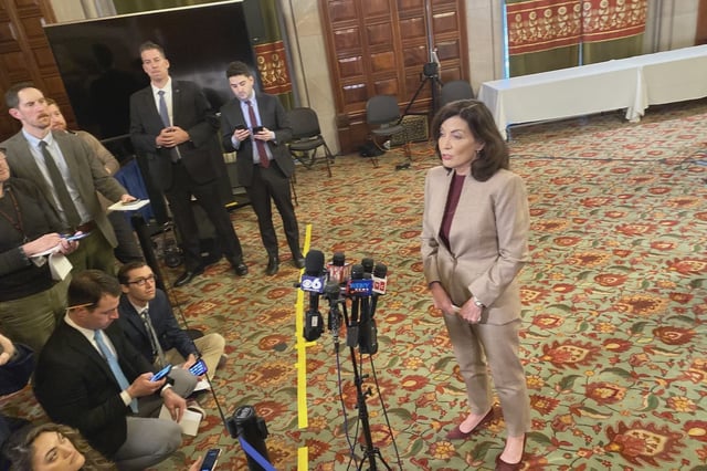 Avi Small (center, red tie) is one of Gov. Hochul's closest aides.
