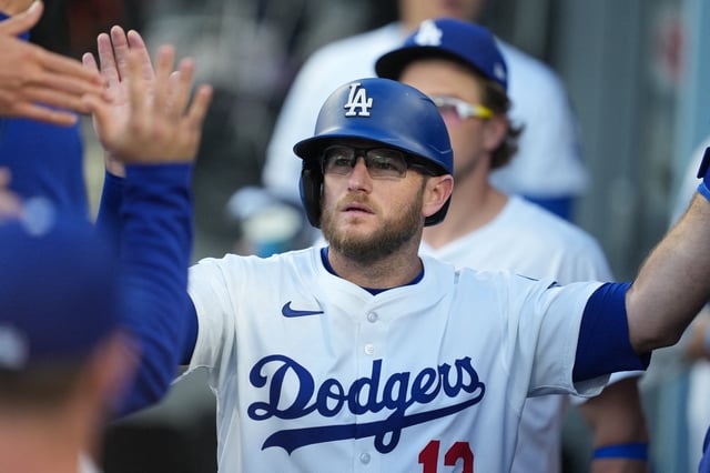 Jul 1, 2025; Los Angeles, California, USA; Los Angeles Dodgers third baseman Max Muncy (13) celebrates scoring during the first inning against the Chicago White Sox  at Dodger Stadium. Mandatory Credit: Kirby Lee-Imagn Images/File Photo