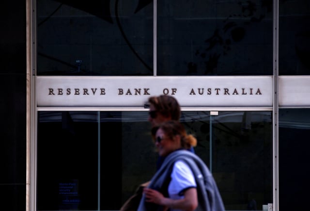 Pedestrians walk past the main entrance to the Reserve Bank of Australia building in central Sydney, Australia, October 3, 2016.  REUTERS/David Gray/ File Photo