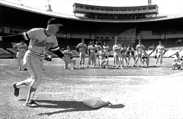 Billy Hunter demonstrates proper baserunning technique during training camp in 1973.