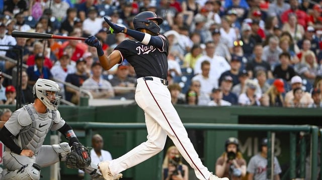 Jul 3, 2025; Washington, District of Columbia, USA; Washington Nationals left fielder James Wood (29) hits a solo home run against the Detroit Tigers during the second inning at Nationals Park. Mandatory Credit: Brad Mills-Imagn Images