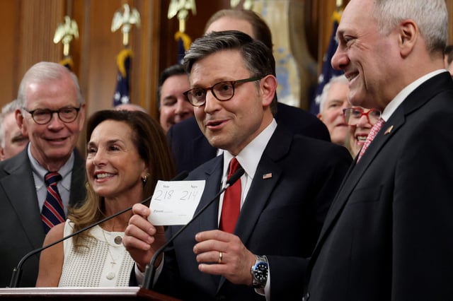 House Speaker Mike Johnson, R-Louisiana, holds a final vote tally note ahead of signing President Donald Trump's sweeping spending and tax bill, on Capitol Hill in Washington, D.C., on July 3, 2025.