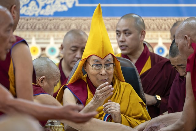 Tibetan spiritual leader the Dalai Lama presides over an event celebrating his 90th birthday according to a Tibetan calendar at the Tsuglakhang temple in Dharamshala, India, Monday, June 30, 2025, ahead of his birthday according to the Gregorian calendar on July 6. (AP Photo/Ashwini Bhatia)