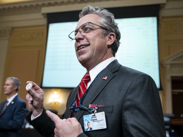 Representative-elect Andy Ogles, a Republican from Tennessee, holds the number one pick coin during the biennial office lottery on Capitol Hill in Washington, DC, US, on Friday, Dec. 2, 2022. New members compete for space in the House's office buildings with the luckiest getting their pick of larger offices or space closer to the main Capitol building, while other members and their staff will be relegated to less-desirable locations for the next two years. Photographer: Al Drago/Bloomberg via Getty Images