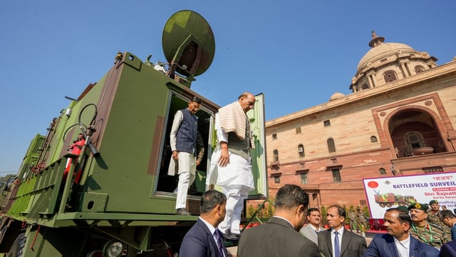 Defence Minister Rajnath Singh with MoS Sanjay Seth during the flagging off ceremony of 'Sanjay' Battlefield Surveillance System (BSS) at South Block. PTI