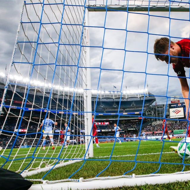 Toronto FC defender Sigurd Rosted (17) picks up the ball after a goal by New York City FC forward Hannes Wolf during the first half of an MLS soccer match Thursday, July 3, 2025, in New York. (AP Photo/Eduardo Munoz Alvarez)
