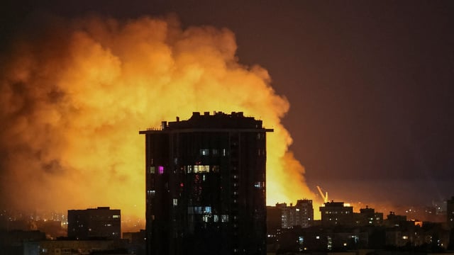 An explosion of a drone lights up the sky over the city during a Russian drone and missile strike, amid Russia's attack on Ukraine, in Kyiv, Ukraine July 4, 2025.