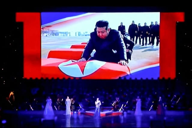 Kim Jong-un honouring the flag-draped coffins of North Korean soldiers killed while helping Russia fight against Ukraine (Photo: KCTV/AFP)