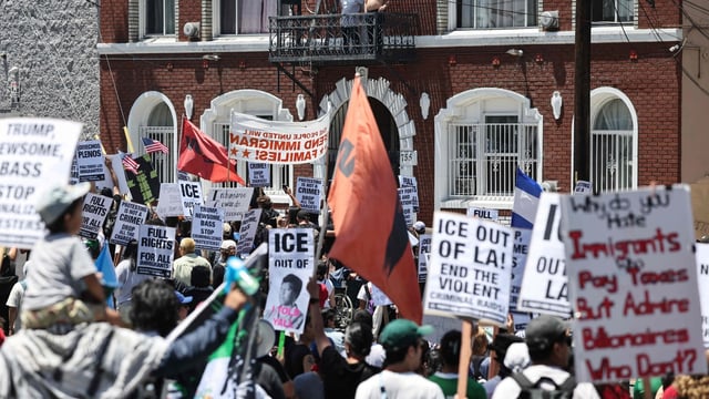 Protestors marched against ongoing ICE raids in the Boyle Heights neighborhood on July 01 in Los Angeles. Organizers called on protestors to call out sick from work and join.