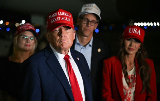 US President Donald Trump talks to journalists as he arrives at Joint Base Andrews, Maryland early on July 4, 2025. Trump returns from Iowa where he spoke at the Salute to America Celebration at the Iowa State Fairgrounds in Des Moines.